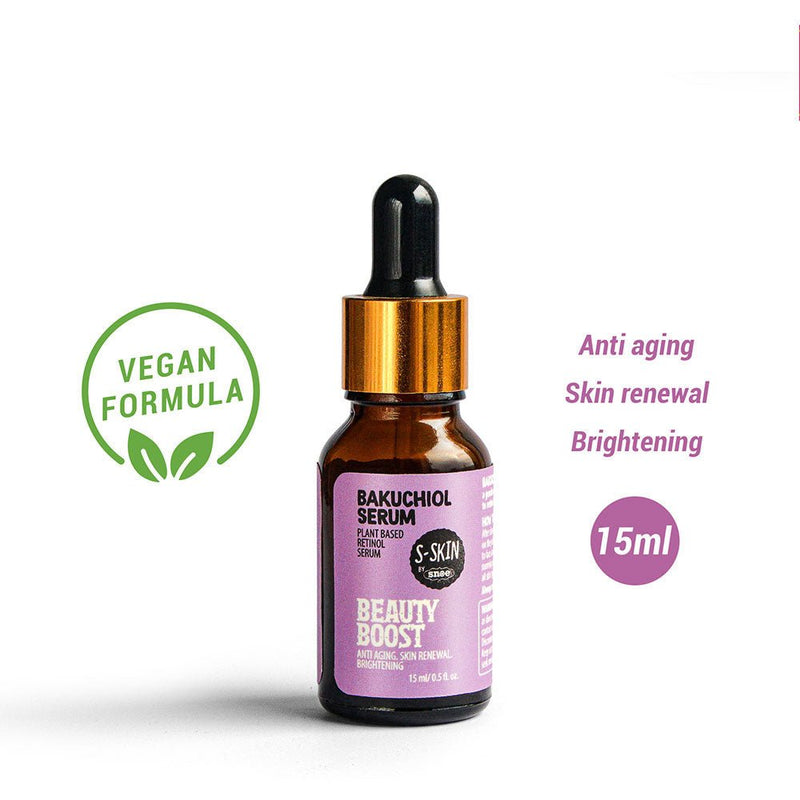 A bottle of the S-SKIN by Snoe Bakuchiol Facial Serum, labeled "Beauty Boost," is set against a white background. The label highlights its "Vegan Formula" and features benefits such as "Anti-aging," "Skin Renewal," and "Brightening." An ideal addition to any beauty routine, the right side showcases a purple circle with the text "15 ml.