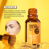 An acne care serum containing BHA Salicylic Acid + Zinc PCA Serum by S-SKIN, perfect for oil control, presented on a vibrant yellow background.