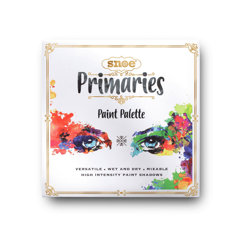 The image displays a square white packaging for the "PRIMARIES PAINT EYESHADOW PALETTE," embellished with vibrant watercolor splashes in the shape of eyes. Below, the text emphasizes its versatility and high intensity, stating "Versatile • Wet and Dry • Mixable High Intensity Paint Shadows," accompanied by decorative gold accents in the corners.
